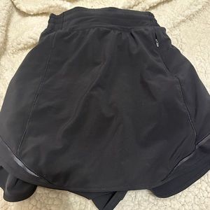 Size 0 black lululemon hotty hot skirt.